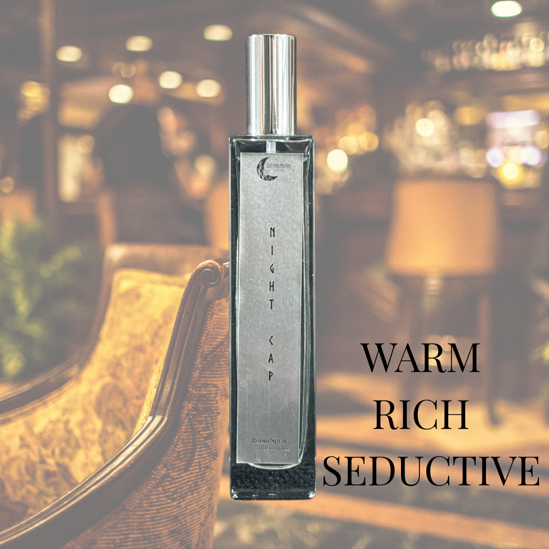 Night Cap Room Spray bottle with a retro whiskey lounge background and text reading “Warm. Rich. Seductive.” to evoke a cozy, intimate vibe.