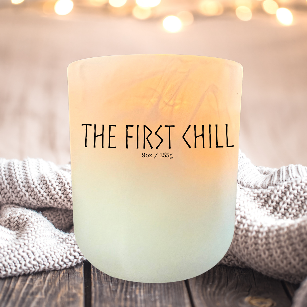 The First Chill soy candle – crisp apple, eucalyptus, and wood fragrance for cozy sweater weather.