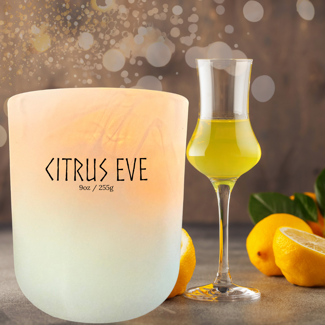 Citrus Eve candle on festive holiday table with lemons and soft lights