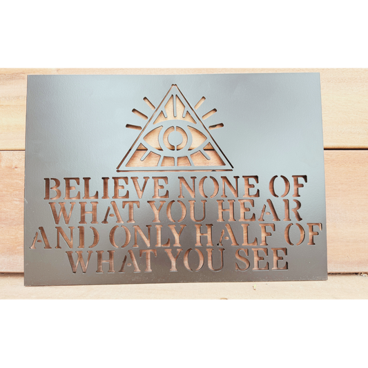 Handcrafted metal sign with all-seeing eye and quote believe none of what you hear and only half of what you see, made from American steel for indoor or outdoor display.