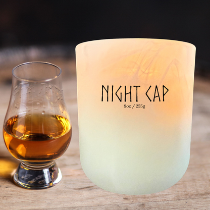 Night Cap soy candle with whiskey glass – warm, sultry handmade candle in cognac, spiced tonka, and musk fragrance.